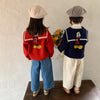 Navy collar Mickey sweater is red