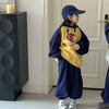 Color-blocked hooded suit in yellow