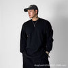 Sweatshirt with split hem and cuffed sleeves in black