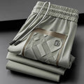 Fashionable European goods rubber pressed casual straight-leg pants Summer thin ice silk men's trendy versatile sports trousers