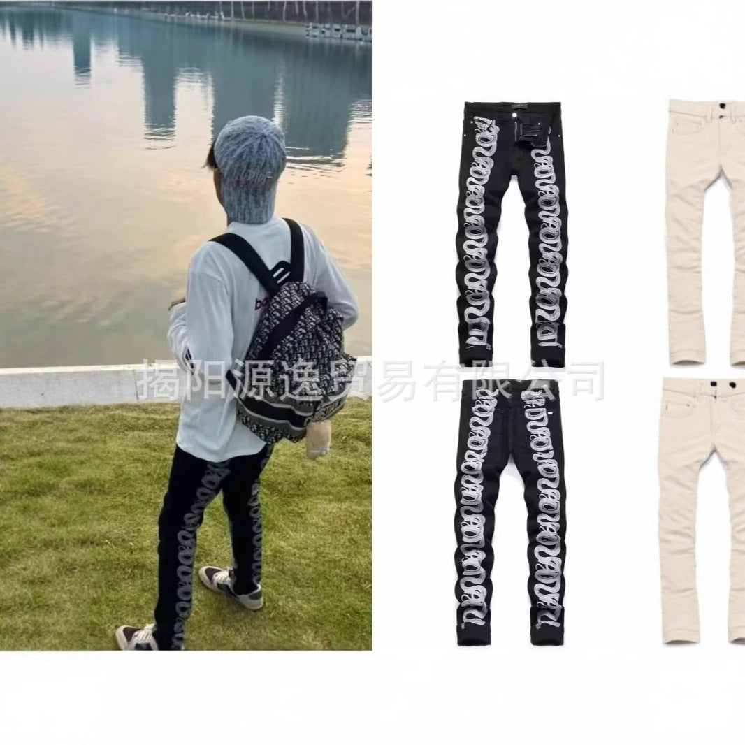 AMIRI Distressed Embroidered Jeans