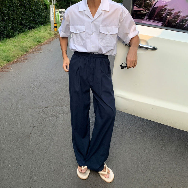 Wide-Leg Pleated Trousers