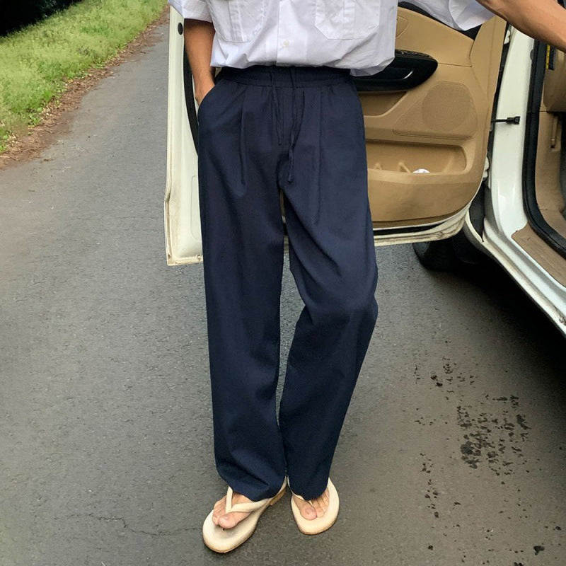 Wide-Leg Pleated Trousers