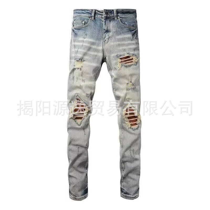 AMIRI Distressed Embroidered Jeans