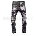 AMIRI Distressed Embroidered Jeans