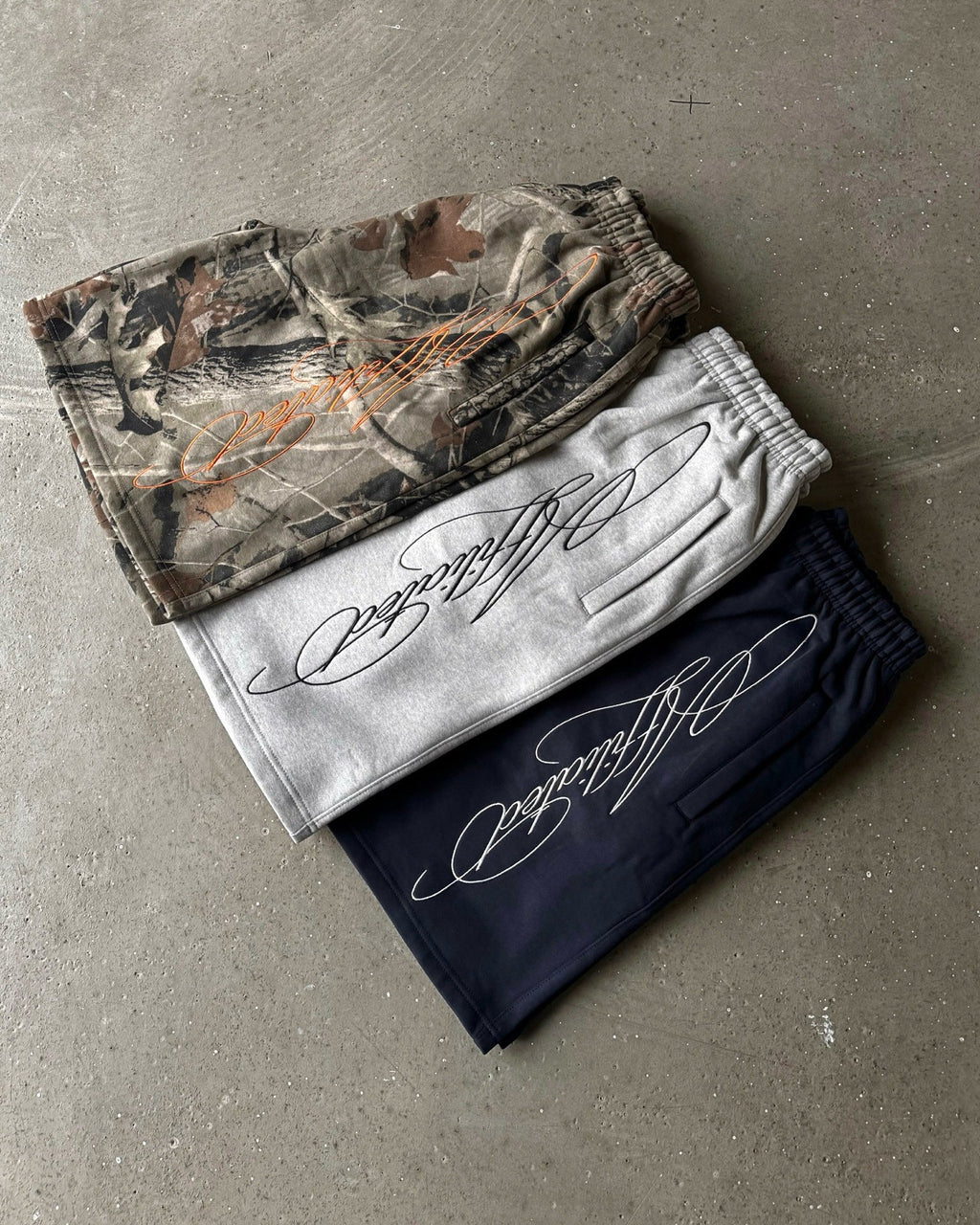 Affiliated Script Embroidered Mesh-Lined Sweat Shorts