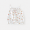 Pink flowers fall all over the camisole shorts