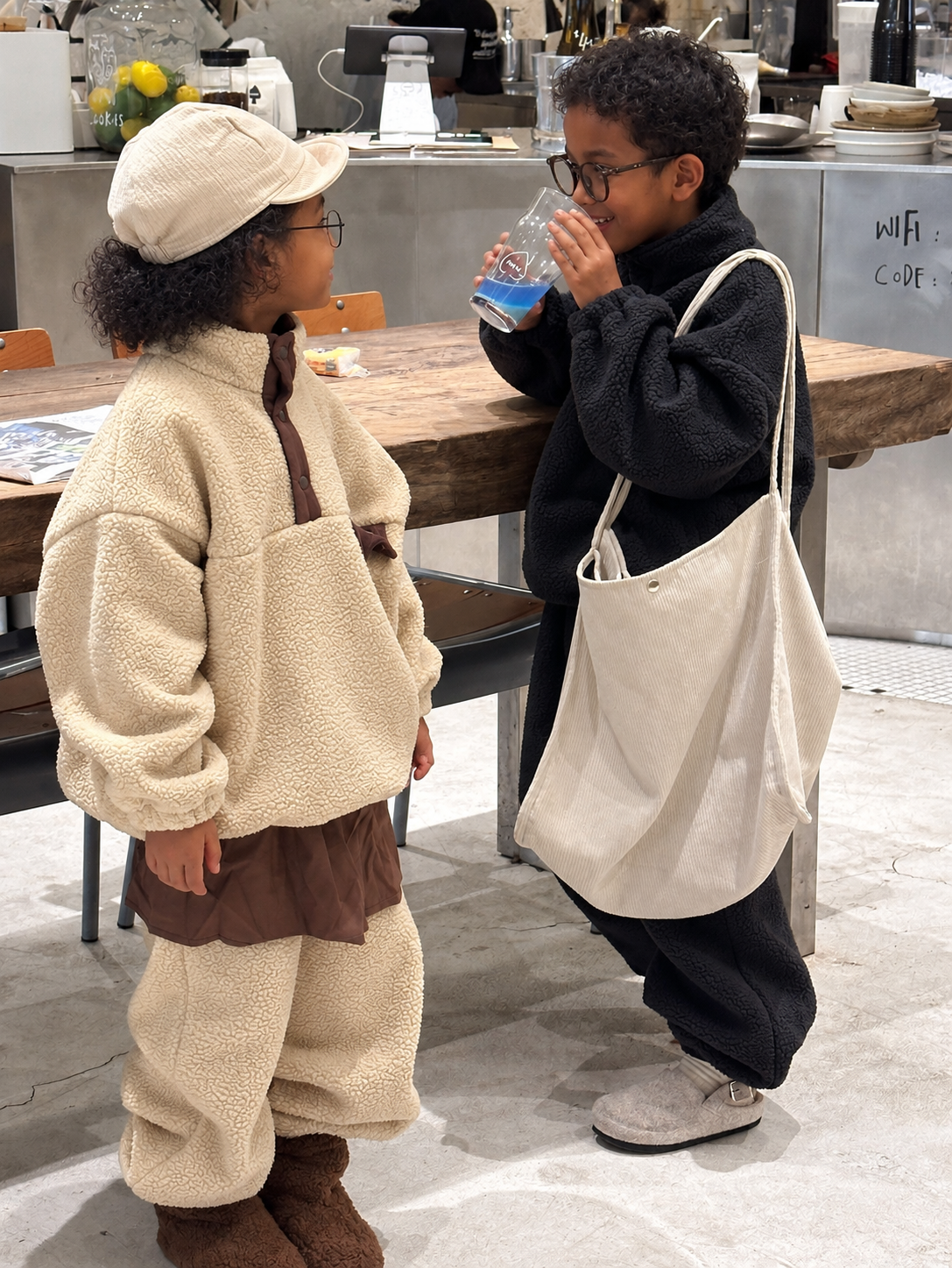 Color-blocked polar fleece outfits on Ethiopian child models
