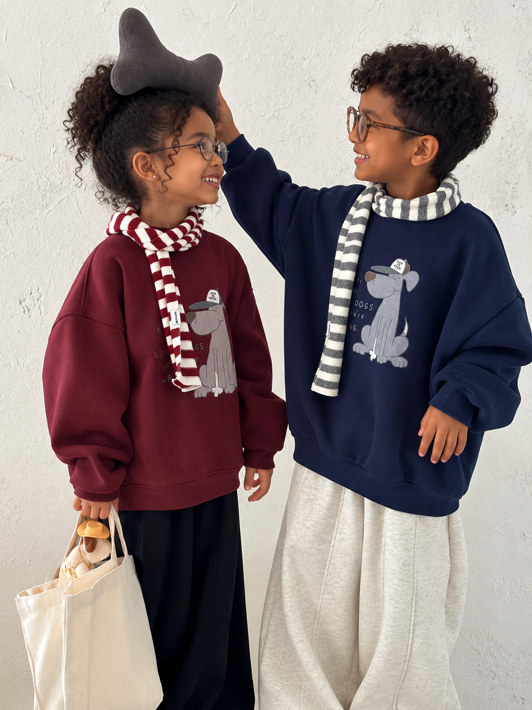 Cartoon puppy fleece hoodie on Ethiopian child models