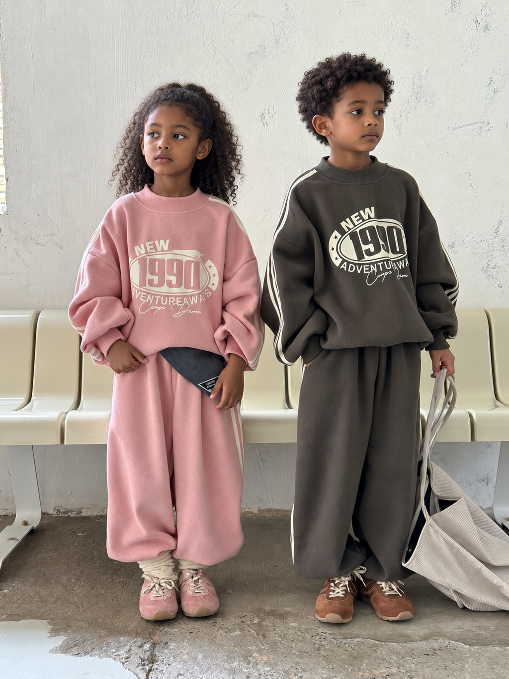 Letter fleece two-piece sets on Ethiopian child models